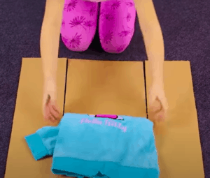 how to fold clothes using cardboard