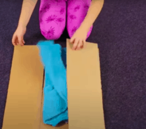 how to fold clothes with cardboard