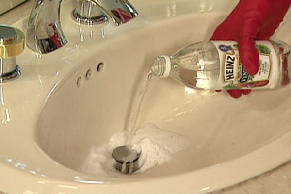 clearing a bathroom sink drain