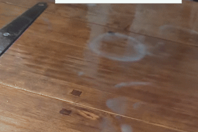 Remove Stains from a Wooden Table with a Towel and Iron