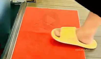 Use Plastic Wrap to Stop a Doormat From Sliding