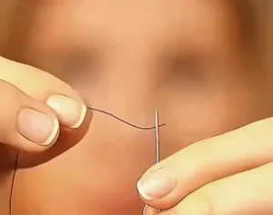 Use a Toothbrush to Thread a Needle Easier